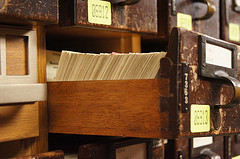 Card catalog drawer pulled out displaying card stack in profile